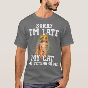 Het spijt me dat ik te laat ben. Mijn kat zat op m T-shirt