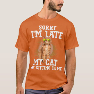 Het spijt me dat ik te laat ben. Mijn kat zat op m T-shirt