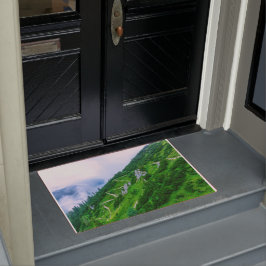 Het steile pad op de berg deurmat