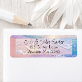 Het strand bij zonsondergang etiket