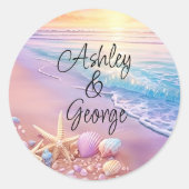 Het strand bij zonsondergang ronde sticker (Voorkant)