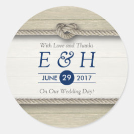 Het vastbinden van de knoop rustieke strand trouwg ronde sticker