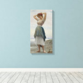 Het verzamelen van kiezels op het strand in Italië Canvas Afdruk (Insitu (Houten vloer))