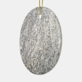 Het vlakke oppervlak van een grijze granietsteen keramisch ornament (Links)