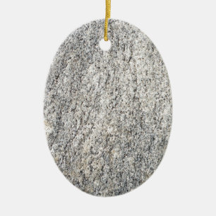 Het vlakke oppervlak van een grijze granietsteen keramisch ornament