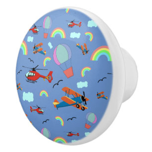 Het vliegpatroon van een jongen op blauw keramische knop