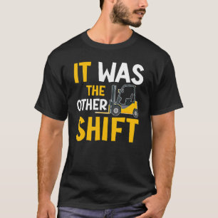 Het was de andere vrachtwagenchauffeur in de lift t-shirt