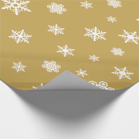 Het Wit van het Patroon van sneeuwvlokken op Goud Cadeaupapier (Hoek)