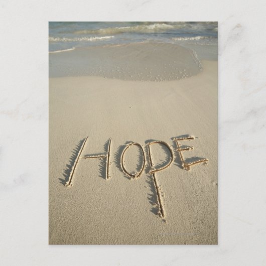 Het woord 'Hope' zand geschreven op het strand met Briefkaart (Voorkant)