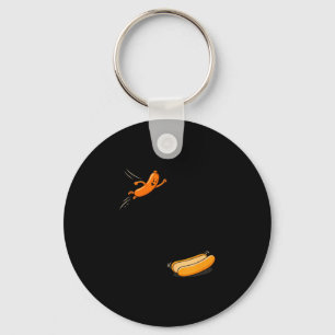Hete honden springen in worst broodje bbq hoge dui sleutelhanger