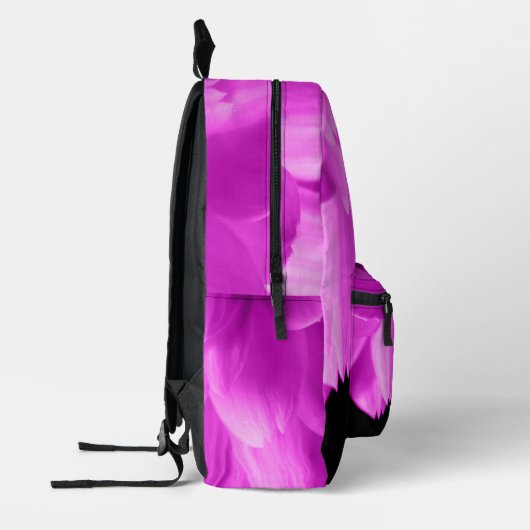 Hete roze bloemblaadjes op zwart bedrukte rugzak (Links)