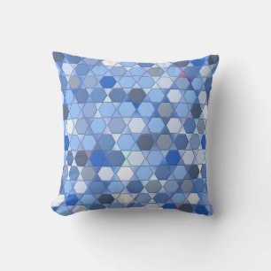 Hexagons in de schaduw van blauw kussen