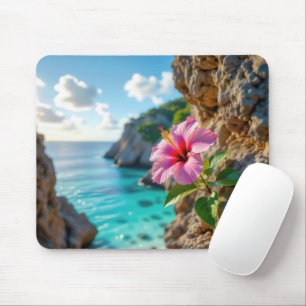 Hibiscus die groeit op een rotsachtige klif muismat