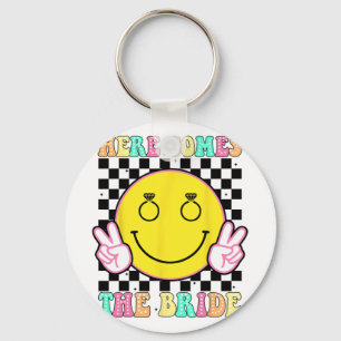 Hier komt de bruid Groovy vrijgezellenfeest thee Sleutelhanger