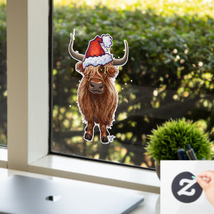 Highland koe in een kerstmuts Christmas Window Cli Raamsticker