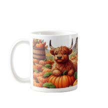 Highland Koe kalveren rusten tussen pompoenen