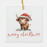 Highland Koe Santa Script naam Merry Christmas Keramisch Ornament<br><div class="desc">Highland Koe Santa Script naam Merry Christmas. Feestelijke schattigheid voor kerstdecor,  met dit leuke ontwerp met een lieve hoogland koe in zijn kerstmuts. Vrolijk kerstfeest is in een stijlvol script.</div>