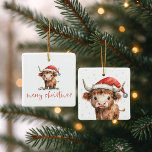 Highland Koe Santa Script naam Merry Christmas Keramisch Ornament<br><div class="desc">Highland Koe Santa Script naam Merry Christmas. Feestelijke schattigheid voor kerstdecor,  met dit leuke ontwerp met een lieve hoogland koe in zijn kerstmuts. Vrolijk kerstfeest is in een stijlvol script.</div>