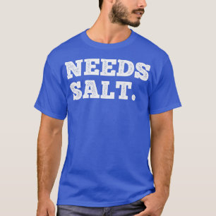 Hij heeft behoefte aan zoutkoek en het ondersteune t-shirt