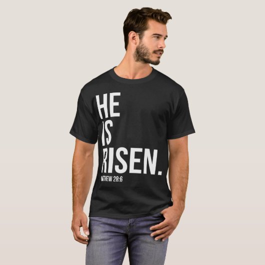 Hij is gerezen Bijbelscriptie verse Christelijk T-shirt (Voorkant volledig)
