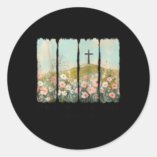 Hij is hier niet, hij is opgestaan met wilde bloem ronde sticker