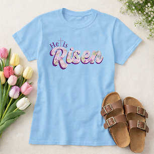 Hij Is Opgestaan Paarse Bloemenschrift Christelijk T-shirt