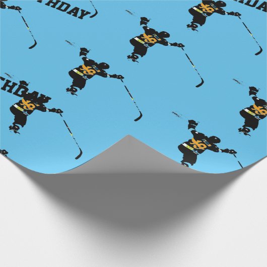 Hij scoort! - IJshockeyspeler Cadeaupapier (Hoek)