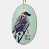 HIs oog staat op de Sparrow Keramisch Ornament (Links)