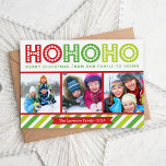 Ho Ho Foto Collage Modern Holiday Card Feestdagenkaart<br><div class="desc">Het moderne kerstfeestelijke fotokaartontwerp is voorzien van een fotocollage met ruimte voor drie van uw familiefoto's en een kleurrijke, leuke whimsical-typografie waarop Ho Ho Merry Kerstmis van Onze familie naar Yours staat afgebeeld met een gewaagde, preppy gestreept rand onderaan. Pas het ontwerp aan met de naam van uw gezin en...</div>