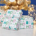 Ho Ho Ho en Stars Pastel Modern Christmas Cadeaupapier<br><div class="desc">Verfraai uw vakantie cadeau-geven met deze moderne witte kerst inpakpapier. Met een eenvoudig maar speels patroon van pastelsterren en de vrolijke woorden "Ho Ho Ho" in blauw, groen en roze, brengt dit ontwerp een frisse en leuke draai aan traditionele vakantiedrap. De heldere witte achtergrond verbetert de zachte, feestelijke kleuren en...</div>