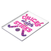 Hockey-kippen in het veld met teken notitieboek (Linkerzijde)