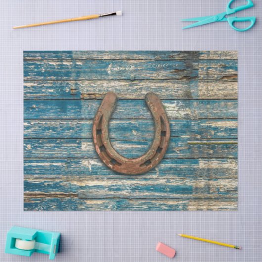 Hoefijzer op blauwe houten borden tissuepapier (Craft)