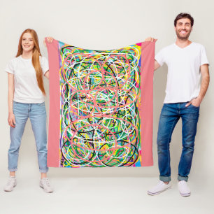 Hoelahoep multi kleuren op zalmroze fleece deken