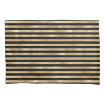 Hoesjes met zwarte en gouden strips voor beddengoe