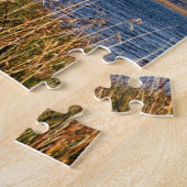 Hoge grassen en met sneeuw bedekte berg puzzel (Zijkant)