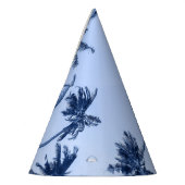 Hoge palmbomen, heldere blauwe lucht. feesthoedjes (Links)