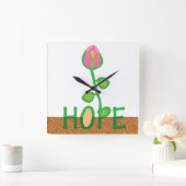 Hogebloemen van geplante zaden vierkante klok (Huis)