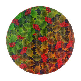 Holly berry en bladeren die de winter doorkruisen snijplank