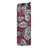 Holly berry, grijze bladeren op donkerrood thermosbeker (Gedraaid links)