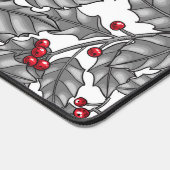 Holly berry, grijze bladeren op wit bureaumat (Hoek)