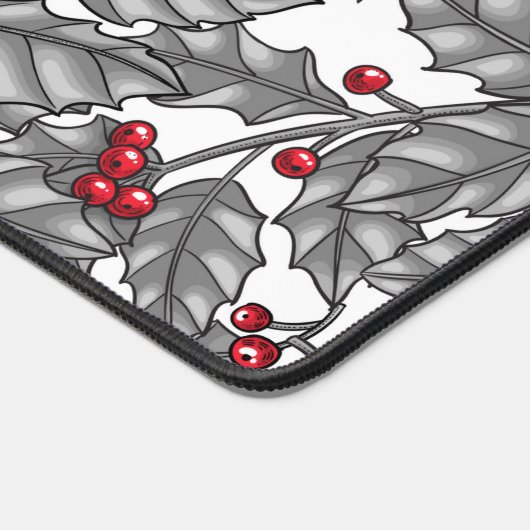 Holly berry, grijze bladeren op wit bureaumat (Hoek)