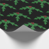 Holly en Holly bessen op zwart inpakpapier (Hoek)