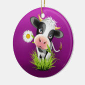 Holstein cow in grass over purple keramisch ornament (Links)