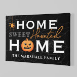 Home Sweet Haunted Home Persoonlijke gepersonalise Canvas Afdruk<br><div class="desc">Welkom uw gasten met deze spookachtige leuke,  gepersonaliseerde halloween canvas wandkunst. Het stijlvolle typografische ontwerp is voorzien van "Home Sweet Haunted Home"-tekst met aangepaste tekst voor uw familienaam en accenten van een enge jack-o-lantern pompoen,  griezelige spin en spinwebachtergrond. Omvat een zwart,  grijs,  wit,  en oranje kleurenschema.</div>