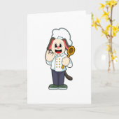 Hond als kok met houten lepel en schort kaart (Gele Bloem)