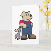 Hond als monteur met moersleutel kaart (Gele Bloem)
