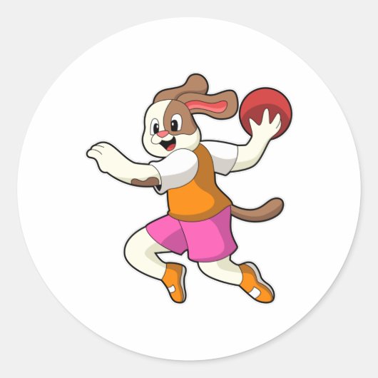 Hond bij Handbalspeler met handbal Ronde Sticker (Voorkant)