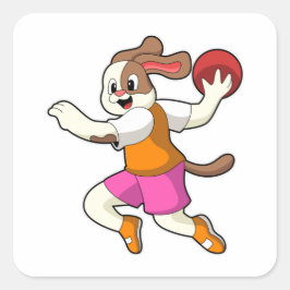 Hond bij Handbalspeler met handbal Vierkante Sticker