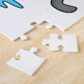 Hond bij ijsschaatsen met ijskoude schaatsen en sc legpuzzel (Zijkant)