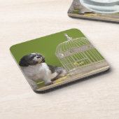 Hond dicht bij een vogelkooi bier onderzetter (Linkerzijde)